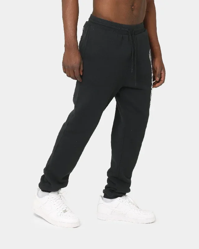 mitchell-ness-raiders-wordmark-sweat-pants-faded-black-mens