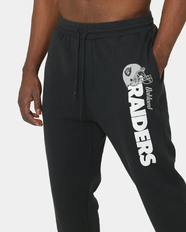 mitchell-ness-raiders-wordmark-sweat-pants-faded-black-mens