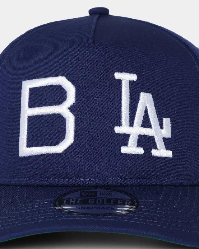 new-era-los-angeles-dodgers-logo-history-old-golfer-snapback-dark-royal-2