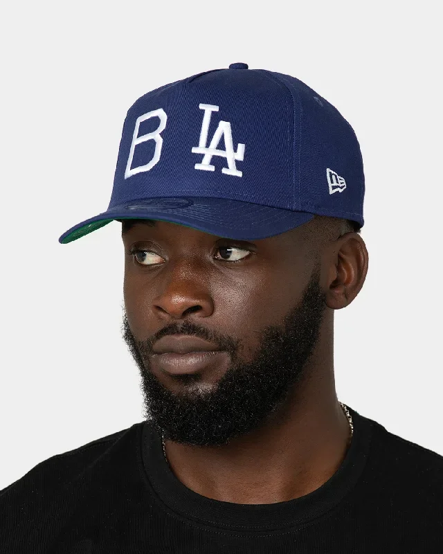 new-era-los-angeles-dodgers-logo-history-old-golfer-snapback-dark-royal-2